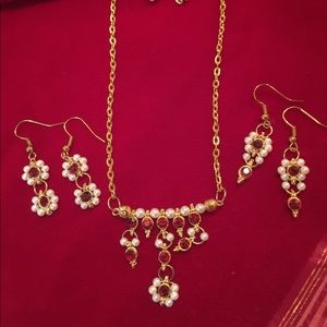 2 earrings sets and necklace